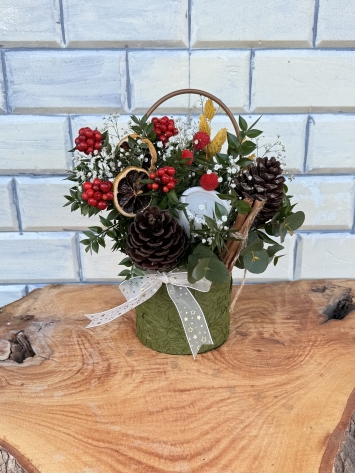 Yeşil kutuda Kokina ve mum